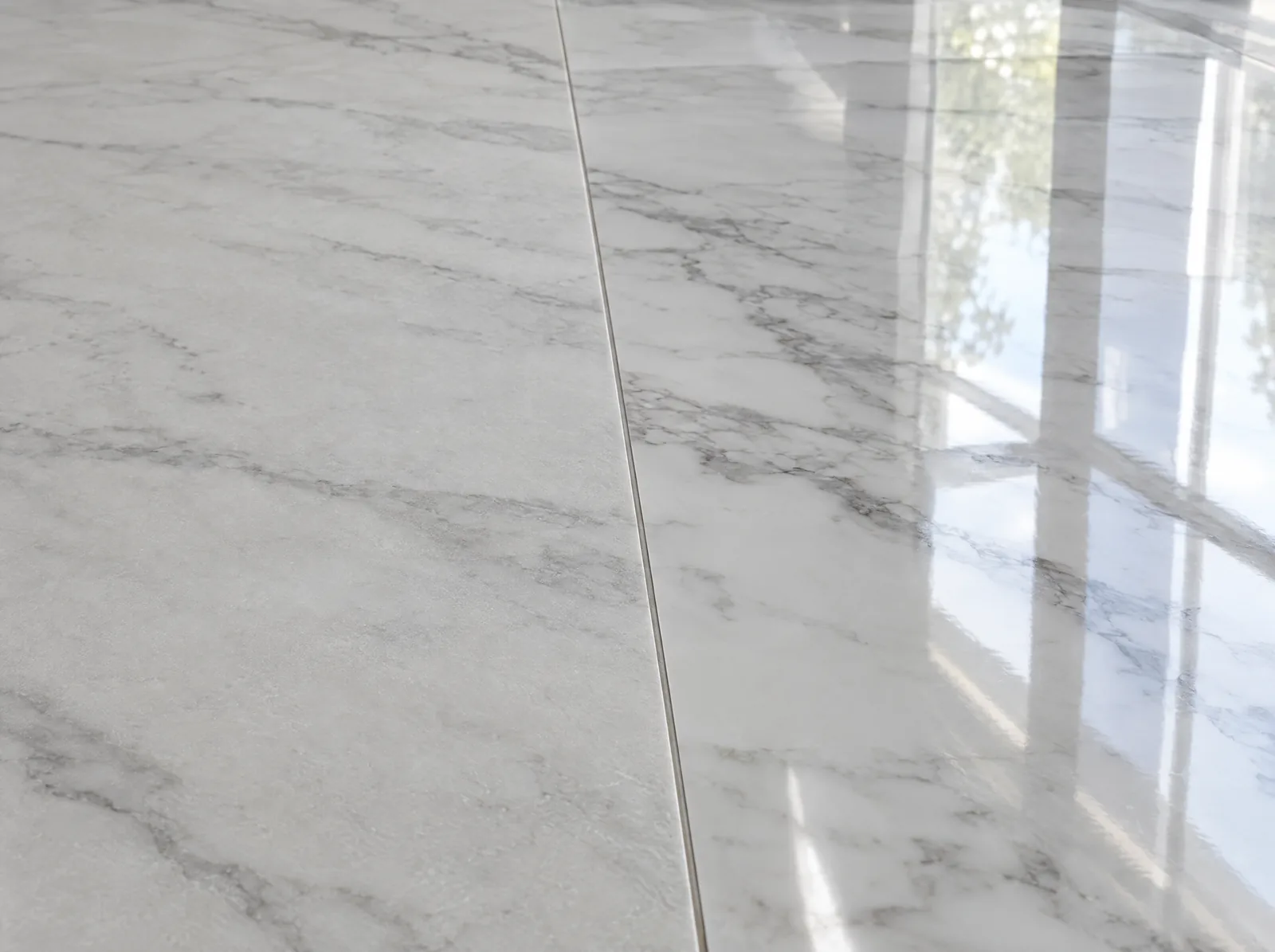 Close-up of honed and polished marble side by side showing the difference in sheen