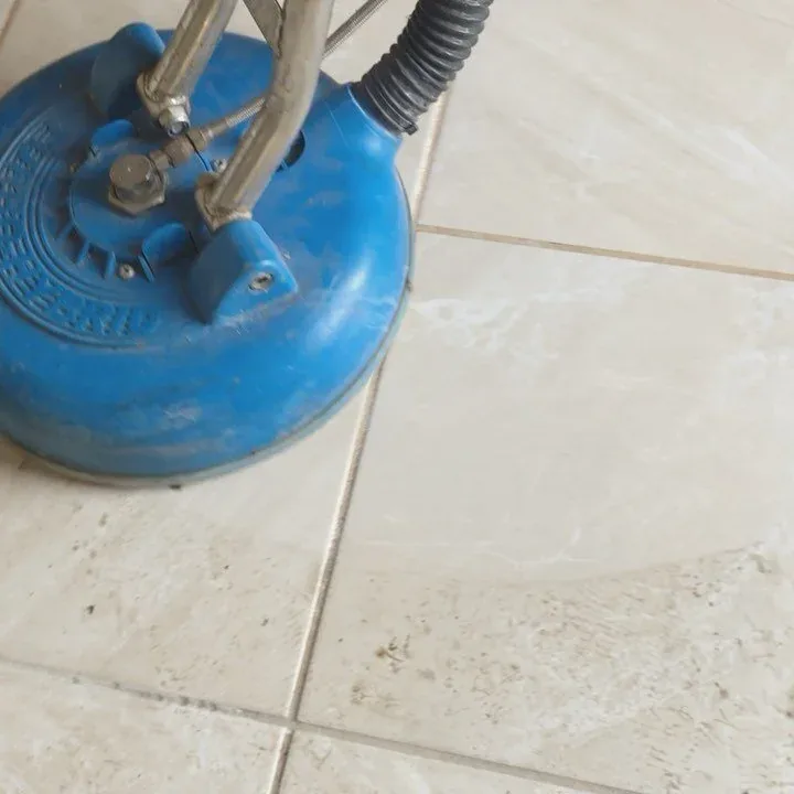 Grout Geek rotary extraction tool deep cleaning a tile floor